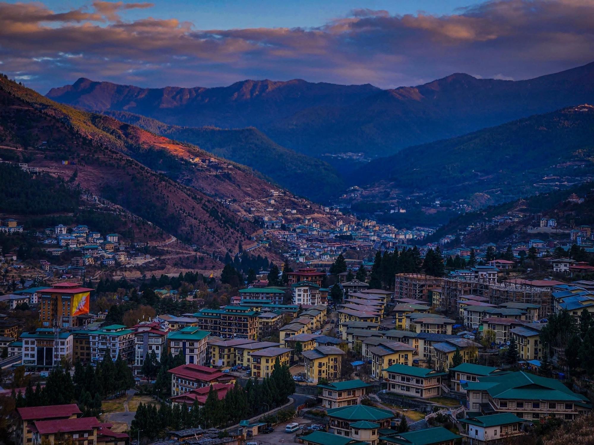 Thimphu spread across its mountain valley in the evening light